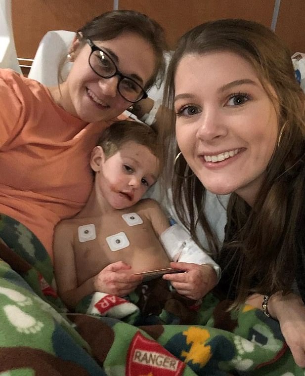 9003074-6634085-Casey_pictured_center_with_his_mom_Brittany_Hathaway_left_and_au-a-3_1548465256240