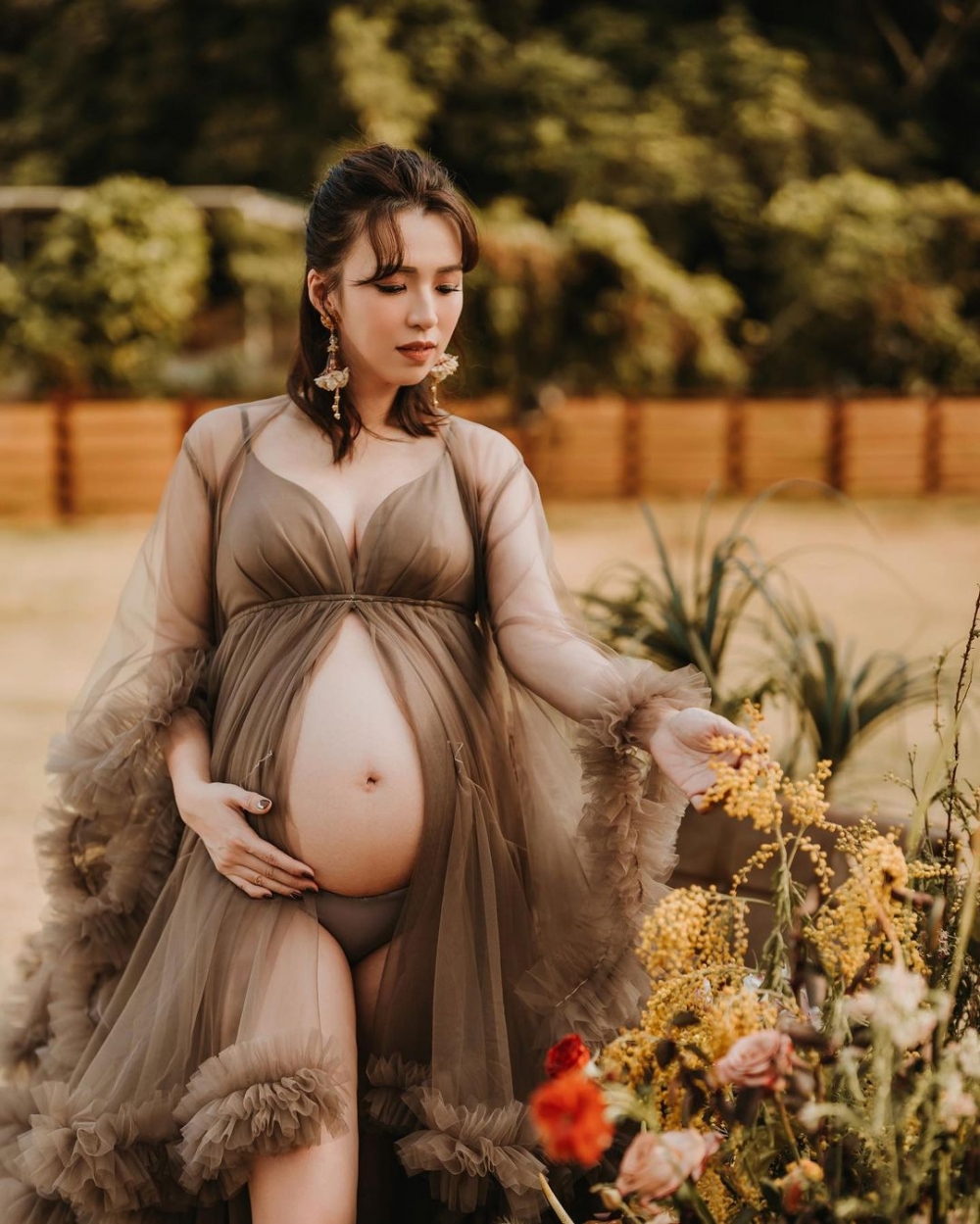 由於肚子夠大，雪雪提前拍孕照