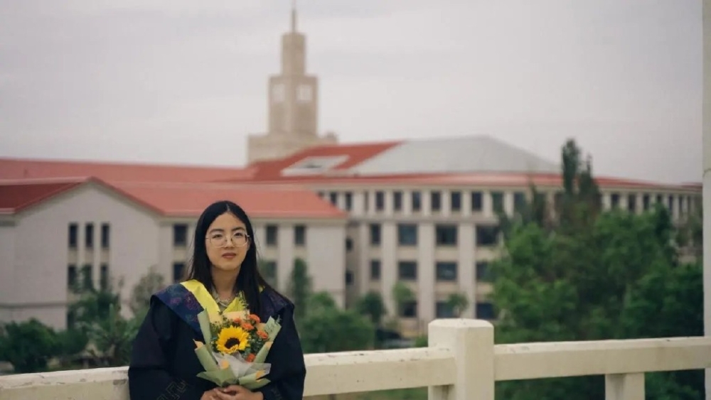 23歲吳玉其同學大學畢業後被保送至復旦大學讀碩士。