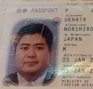 故取得護照頭像還是肥肥的樣子。