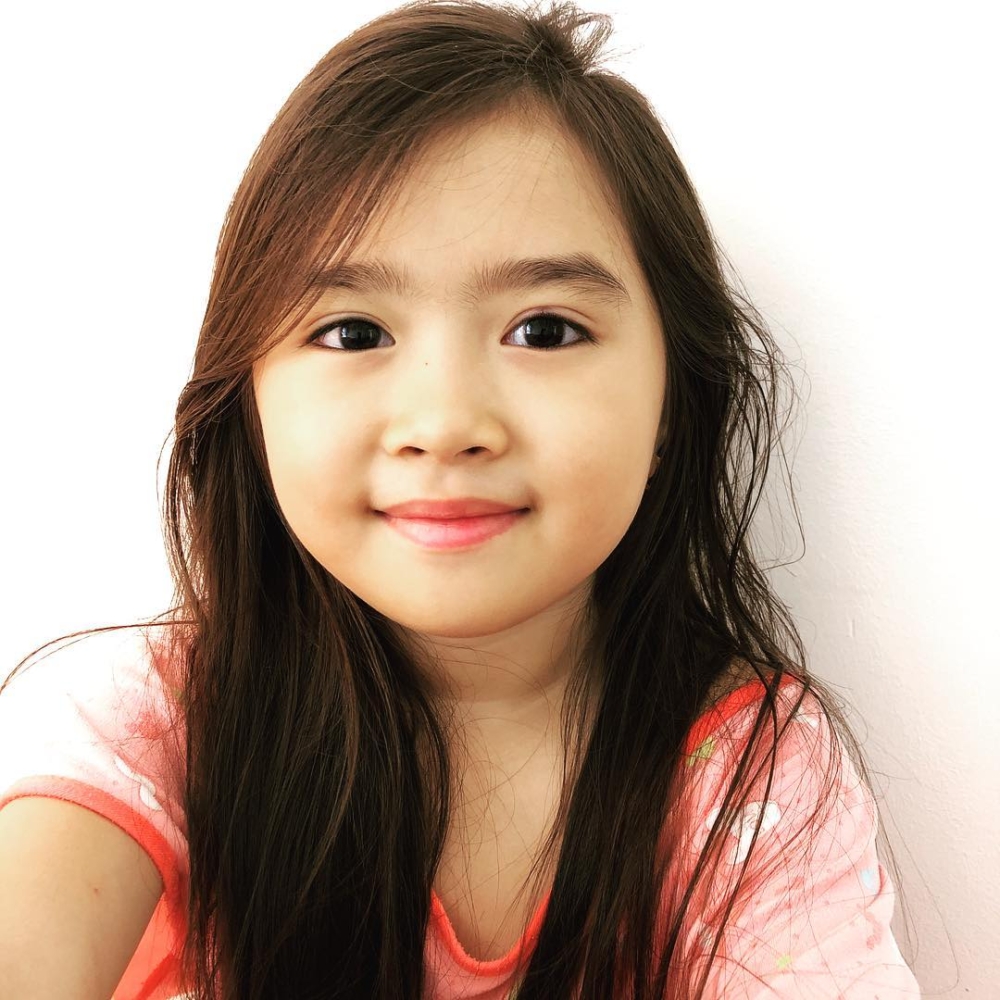 Breanna在父母的守護下快樂成長