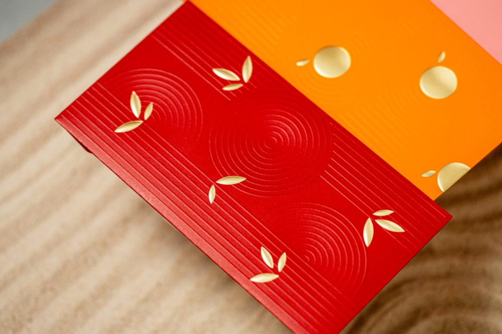 太古城中心「福樂滿載」利是封套裝以日式枯山水為設計概念。