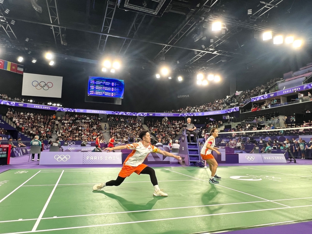 鄧俊文（左）與拍檔謝影雪都是著名的羽毛球選手